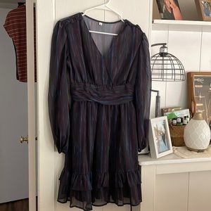 This is a very nice dress. It has only been worn to try on to see if it fits.